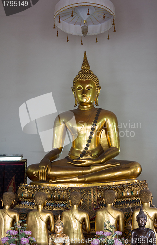 Image of Single ornate buddha statue in Wat Po temple