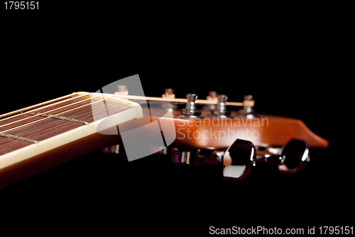 Image of View down the fretboard of guitar