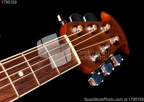 Image of View down the fretboard of guitar