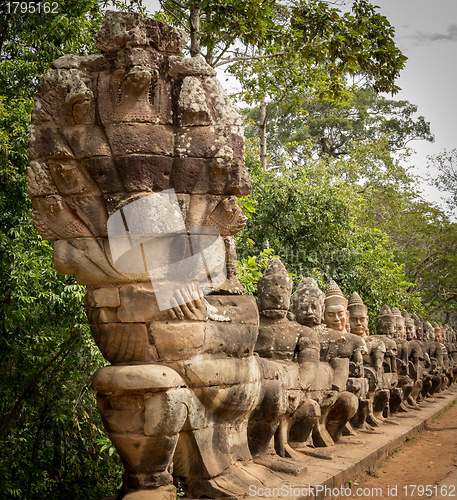 Image of Warriors line entrance to south gate angkor thom
