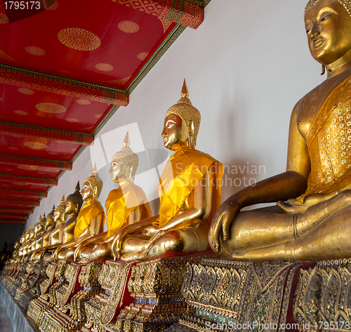 Image of Row of buddha statues in Wat Po temple