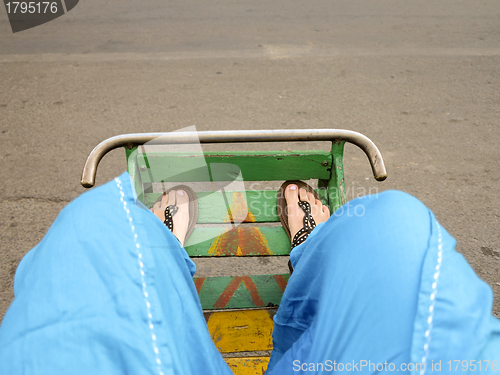 Image of Customer on cyclo in Phnom Penh