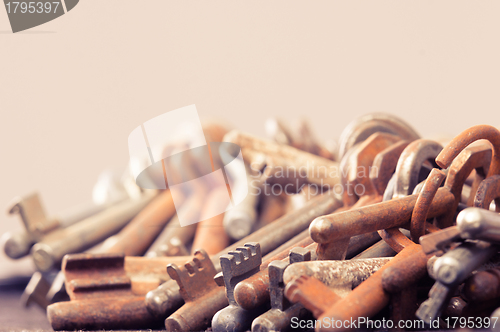 Image of A large group of rusty keys