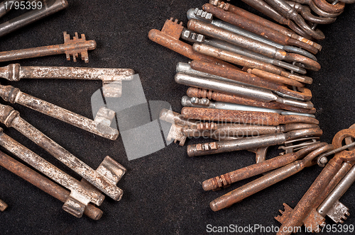 Image of A large group of rusty keys