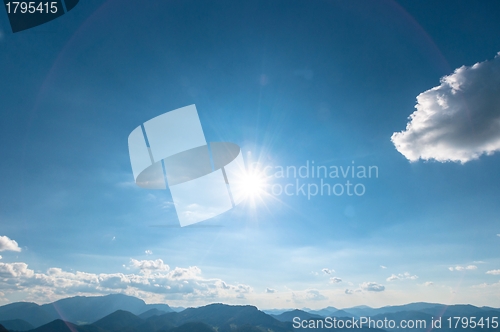 Image of Blue sky with sun