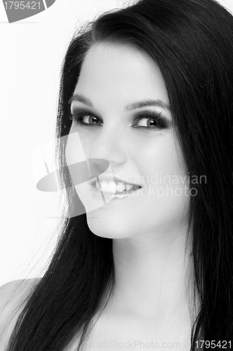 Image of Closeup of a cheerful young woman smiling