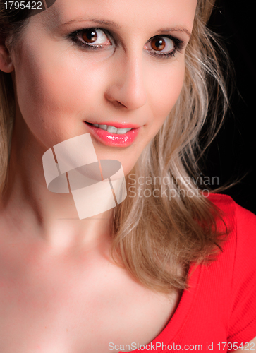 Image of Young adult woman smiling