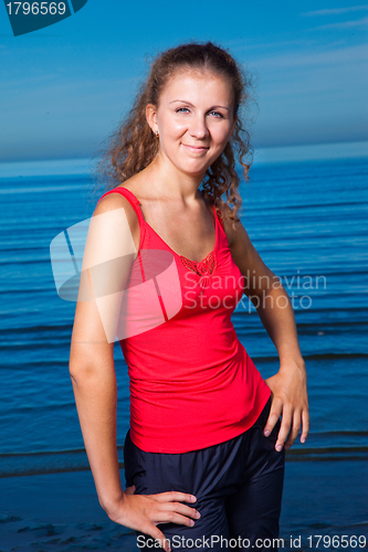 Image of Cute sport girl at the beach