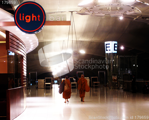 Image of Monks walking into the light - EDITORIAL