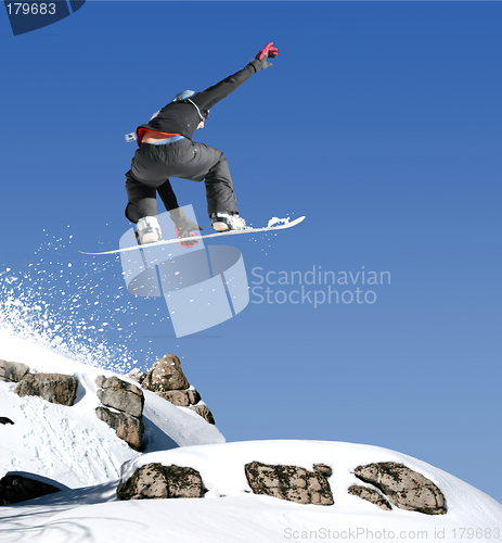 Image of Snowboarder jumping