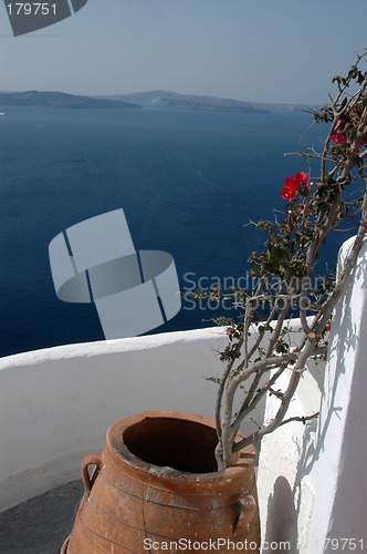 Image of pot with plant over sea greek islands