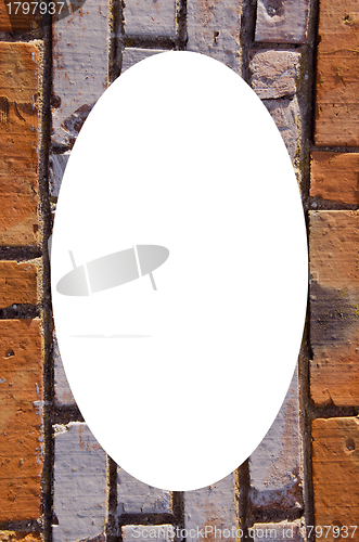 Image of Background of red brick wall white oval in center 