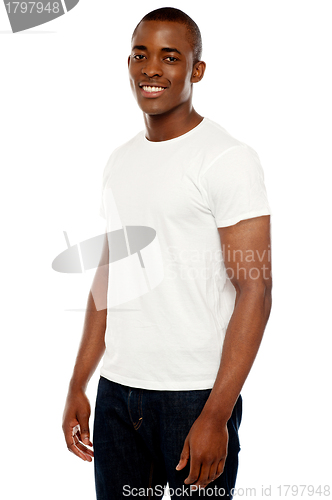 Image of Casual young african man posing
