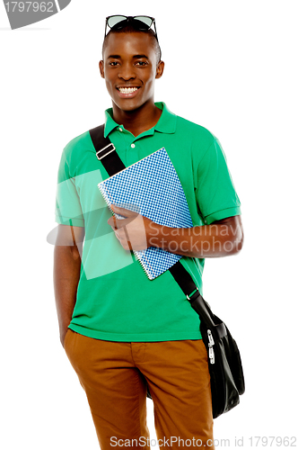 Image of College student with sunglasses over his head