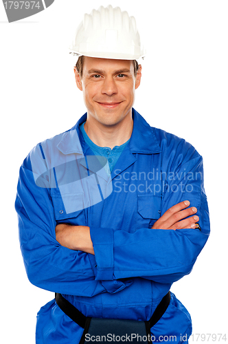 Image of Attractive repairman posing with style