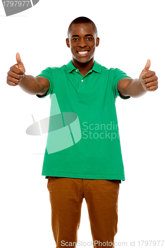 Image of Handsome african showing double thumbs up