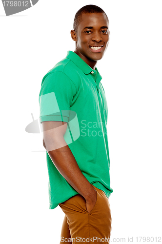 Image of Side view portrait of smiling casual african guy