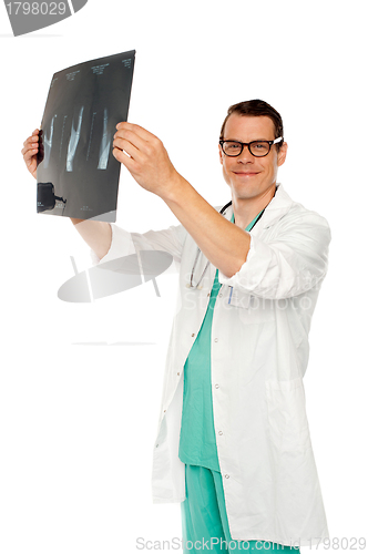 Image of Medical specialist examining patients x-ray