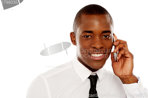 Image of Closeup shot of executive on phone call