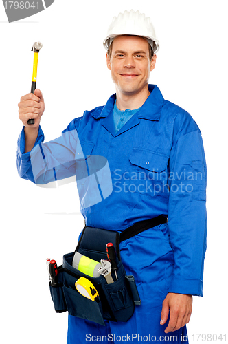 Image of Male architect team guy holding hammer