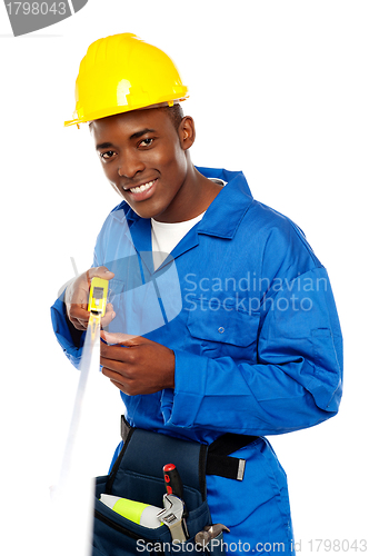 Image of Portrait of african repairman with measuring tape