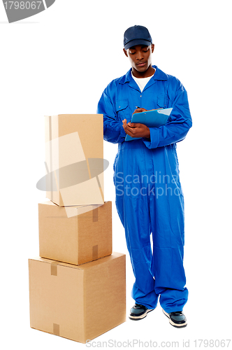 Image of Delivery boy at work. Kindly accept your goods