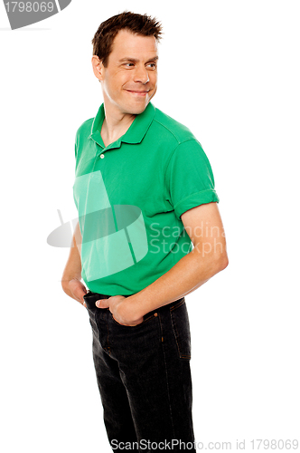 Image of Handsome young man with hands in pocket