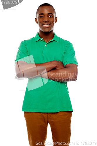 Image of Smiling african guy with crossed arms