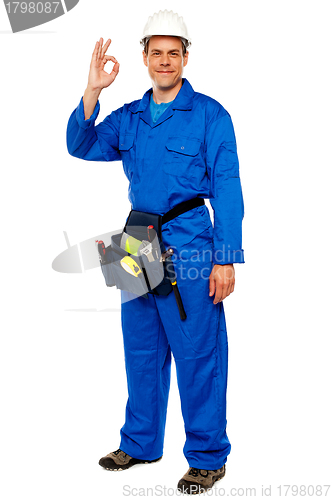 Image of Construction worker gesturing okay sign