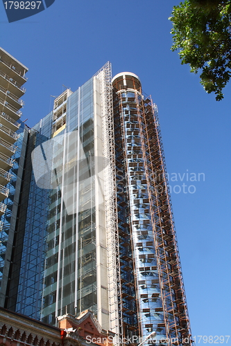 Image of Modern building under construction in glass and concrete.