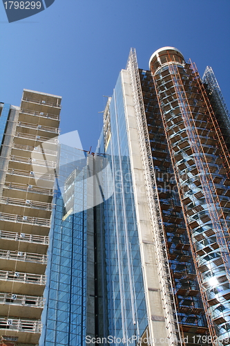 Image of Modern high-rise building under construction. 