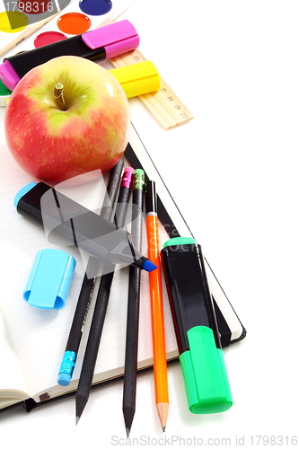 Image of Notebook,pencils, paint and markers, back to school.