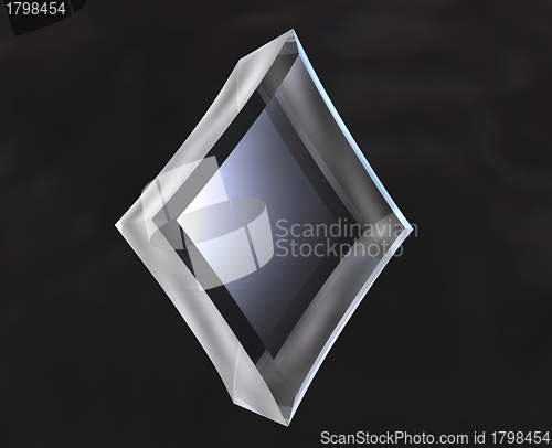 Image of diamond symbol in transparent glass on black background 
