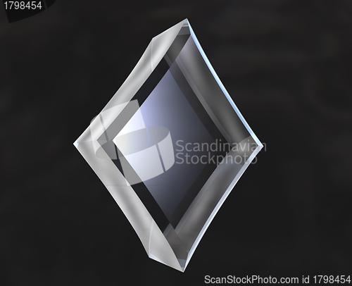 Image of diamond symbol in transparent glass on black background 