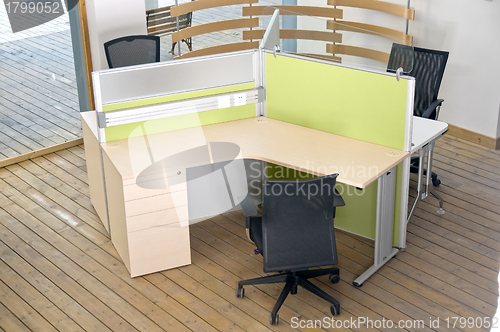 Image of office desks and black chairs cubicle set 
