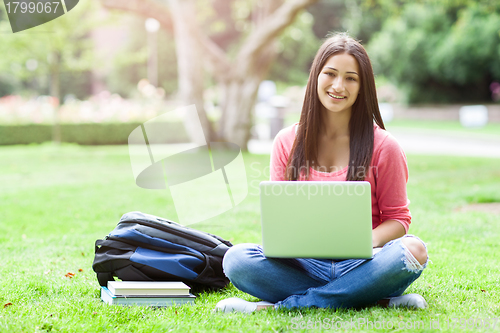 Image of Hispanic college student with laptop