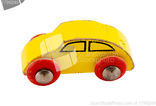 Image of Wooden yellow retro toy car isolated on white 