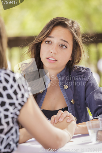 Image of Attractive Girl Comforting A Friend