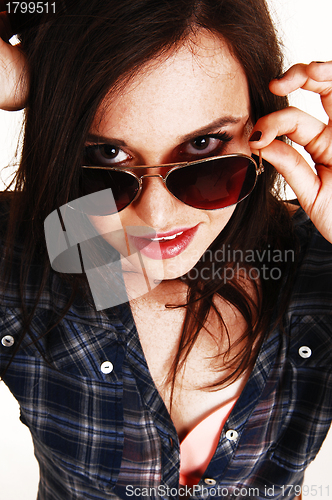 Image of Closeup of girl with sunglasses.