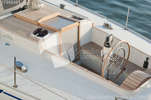 Image of Steer and compass on sailing boat