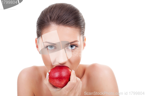 Image of  she bites red apple