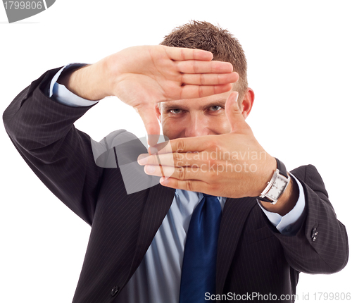 Image of business man making a hand frame 