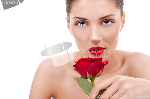 Image of beautiful woman with rose