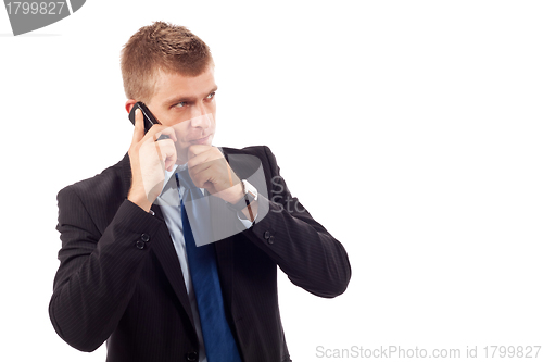 Image of business man talking on cell phone 