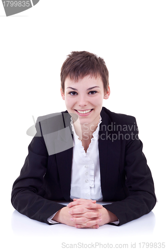 Image of business woman behind the desk