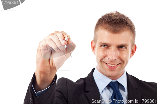 Image of businessman with  marker in hand, writing