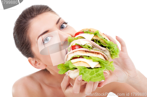 Image of young woman eating fast food