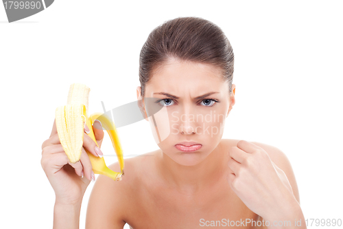 Image of angry woman eating a banana