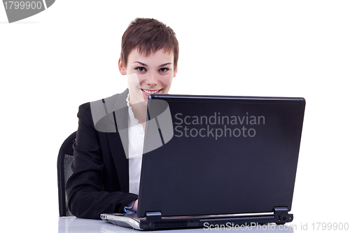 Image of business woman working on laptop