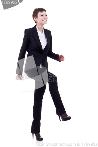 Image of woman stepping on imaginary step